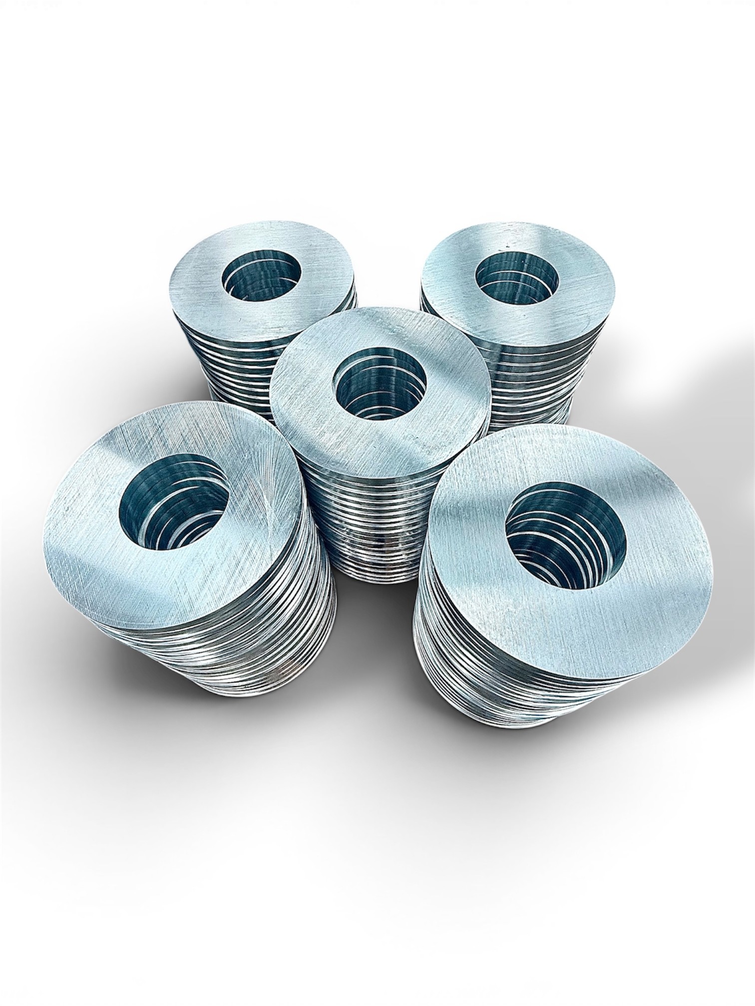 Stacked machined rings during production
