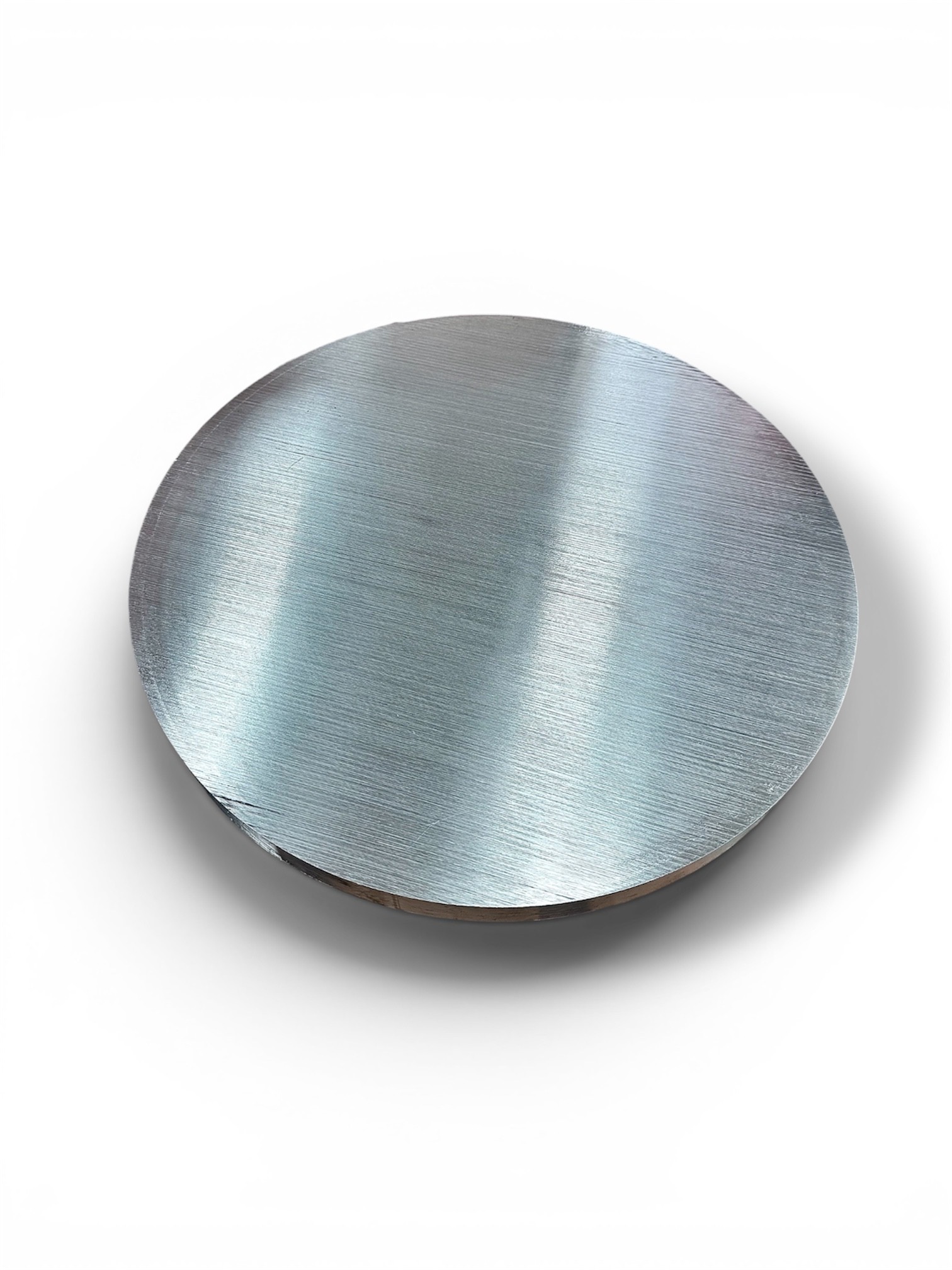 Round raw material blank before machining